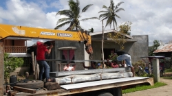 Unloading Roofing in Osmena, Samar
